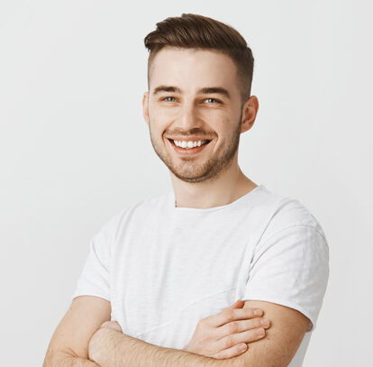Smiling boy after undergoing tooth desensitization for his sensitive teeth in Oshawa, ON.