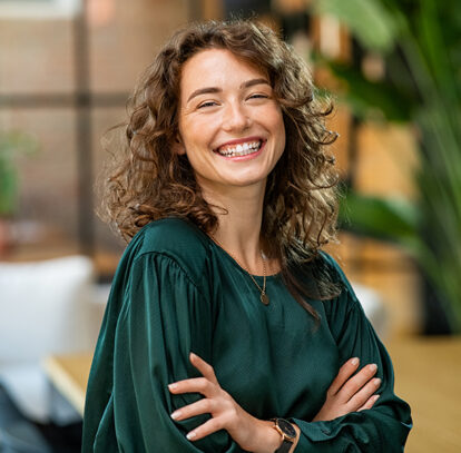 Beautiful smiling girl with perfect white teeth after professional teeth whitening in Oshawa, ON.