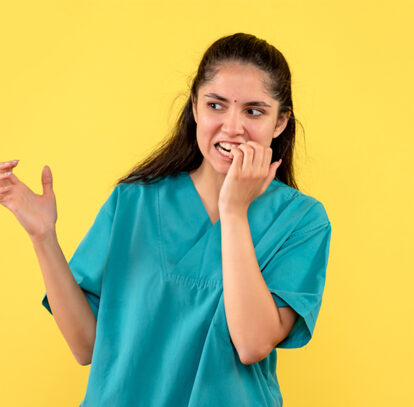 Girl biting her nails.